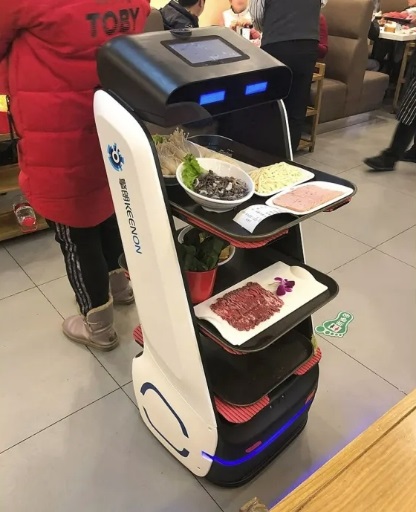 香港智能餐厅全程自动化 送餐机器人成餐厅标配